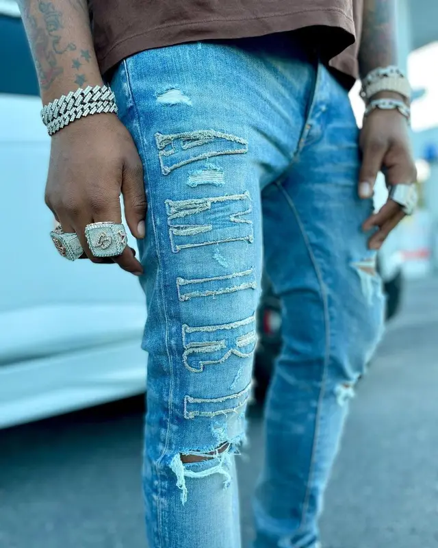 CJ So Cool outfit in Amiri, Balenciaga, and Louis Vuitton, 2021