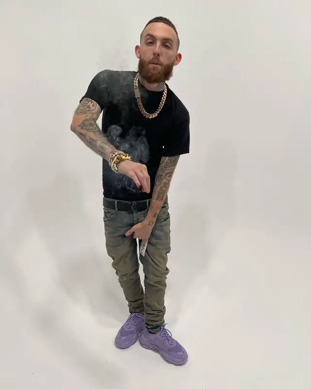 Gutta100 outfit in Purple Brand, Balenciaga, and Louis Vuitton, 2021