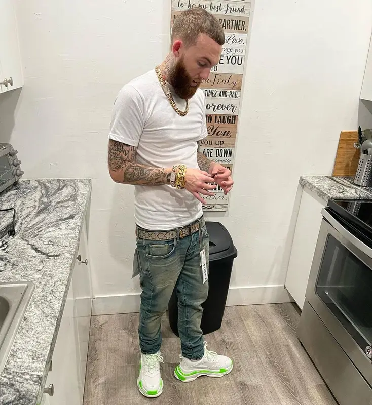 Gutta100 outfit in Purple Brand, Balenciaga, and Gucci, 2021