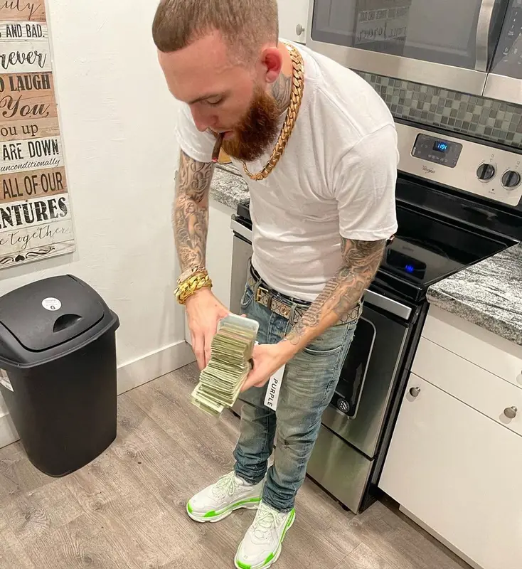 Gutta100 outfit in Purple Brand, Balenciaga, and Gucci, 2021