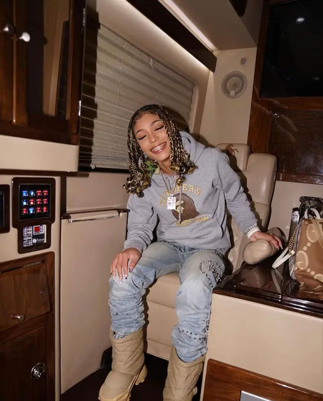 Coi Leray outfit in Bape, Gucci, and OVO, 2021