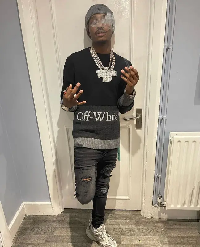 Lil Tjay outfit in Amiri, Balenciaga, and Off-White, 2021