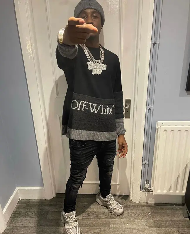 Lil Tjay outfit in Amiri, Balenciaga, and Off-White, 2021