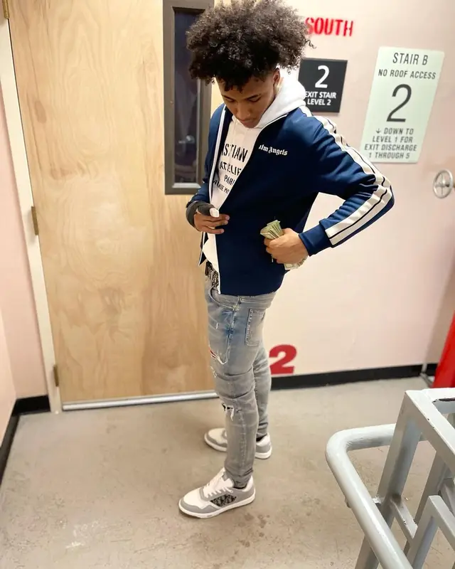 Mikey outfit in Palm Angels, Dior, and Amiri, 2021