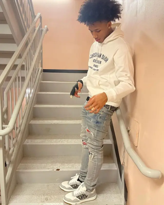 Mikey outfit in Palm Angels, Dior, and Amiri, 2021