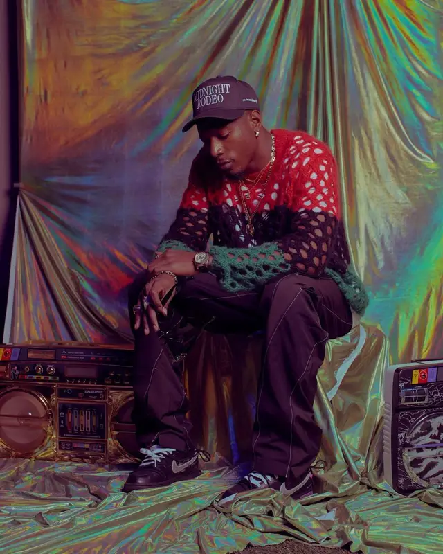 Joey Badass outfit in Denim Tears, Post Archive Faction, and Nike, 2021