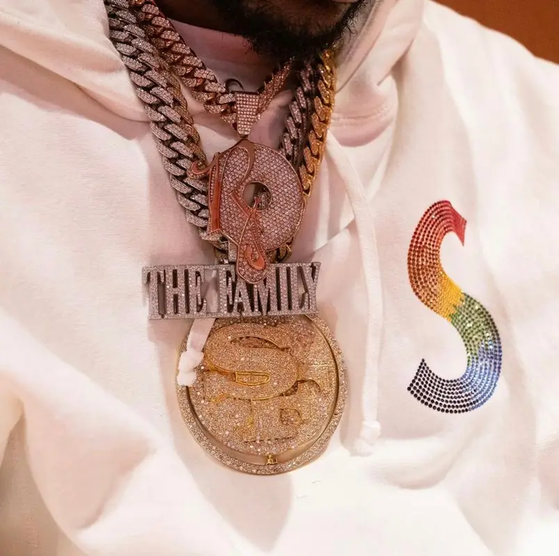 Fabolous outfit in Supreme, J Balvin Merch, and New Era, 2021