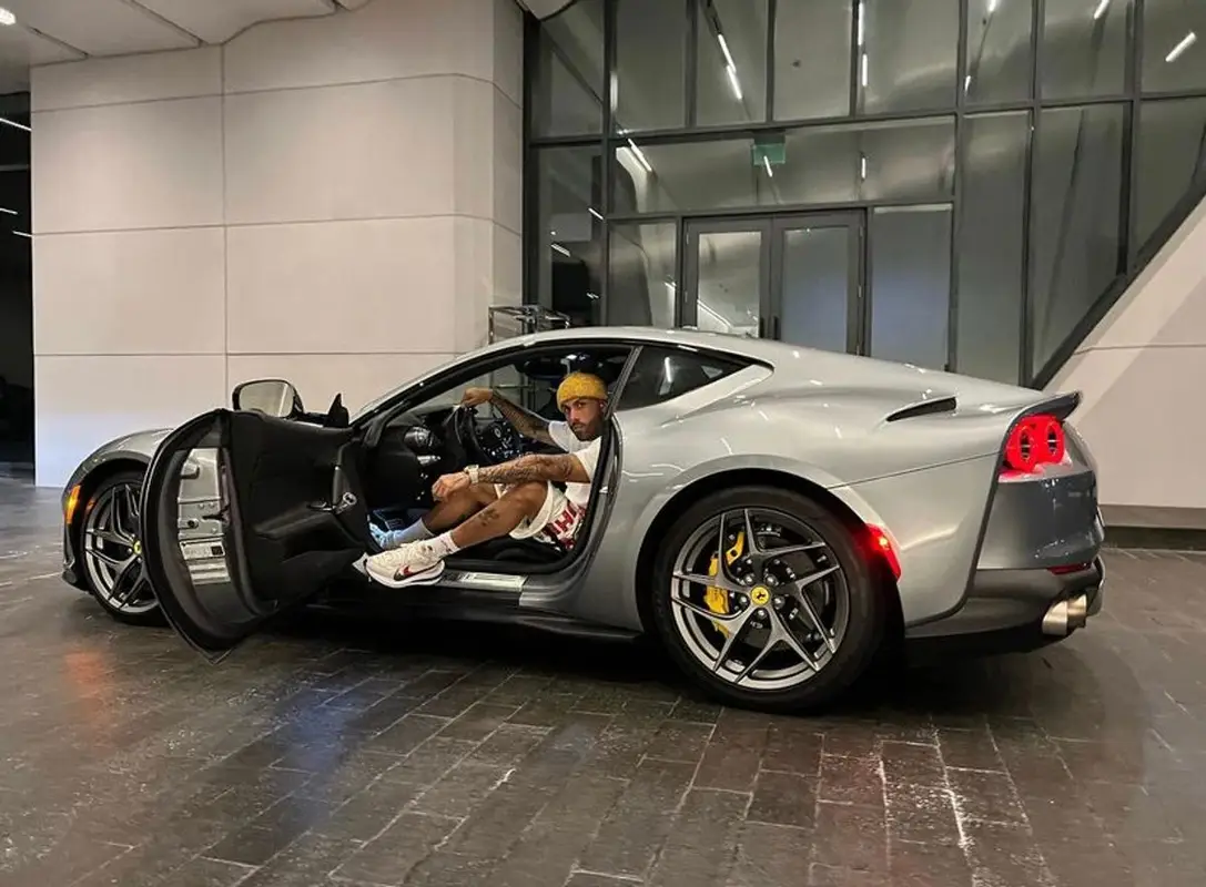 Nicky Jam outfit in Christian Sex Club, Nike, and Dior, 2021