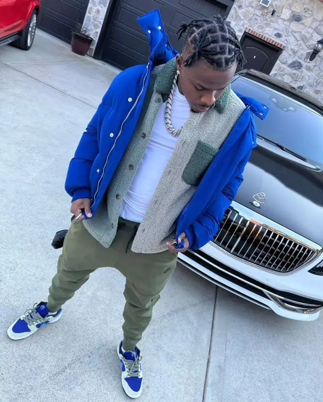 DaBaby outfit in Alexander McQueen, Nike, and Polo Ralph Lauren, 2021