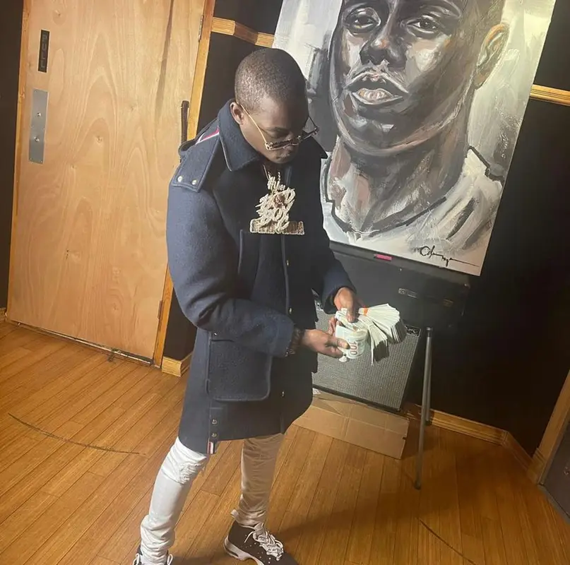 Bobby Shmurda outfit in Thom Browne, Amiri, and Polo Ralph Lauren, 2021