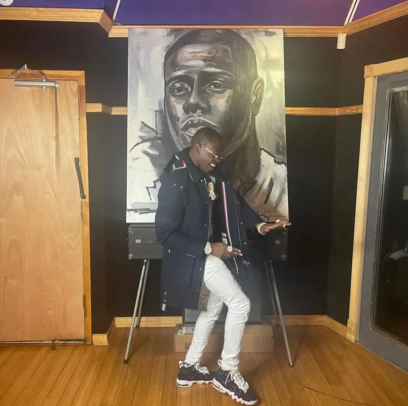 Bobby Shmurda outfit in Thom Browne, Amiri, and Polo Ralph Lauren, 2021