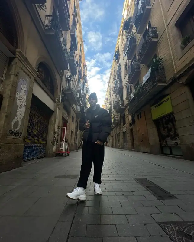 Rauw Alejandro outfit in Supreme, Nike, and Burberry, 2021