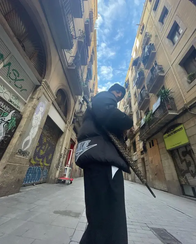 Rauw Alejandro outfit in Supreme, Nike, and Burberry, 2021