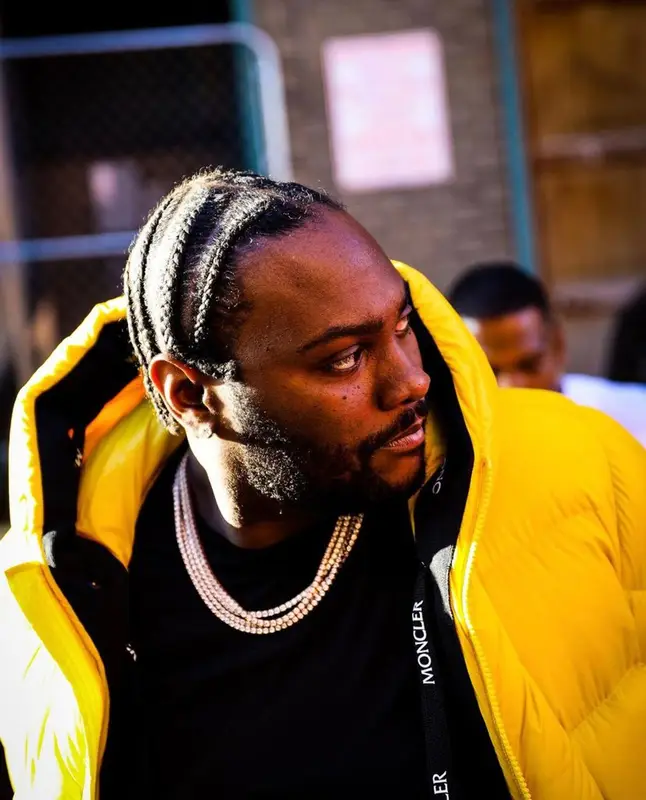 Peezy outfit in Moncler, Timberland, and Prada, 2021