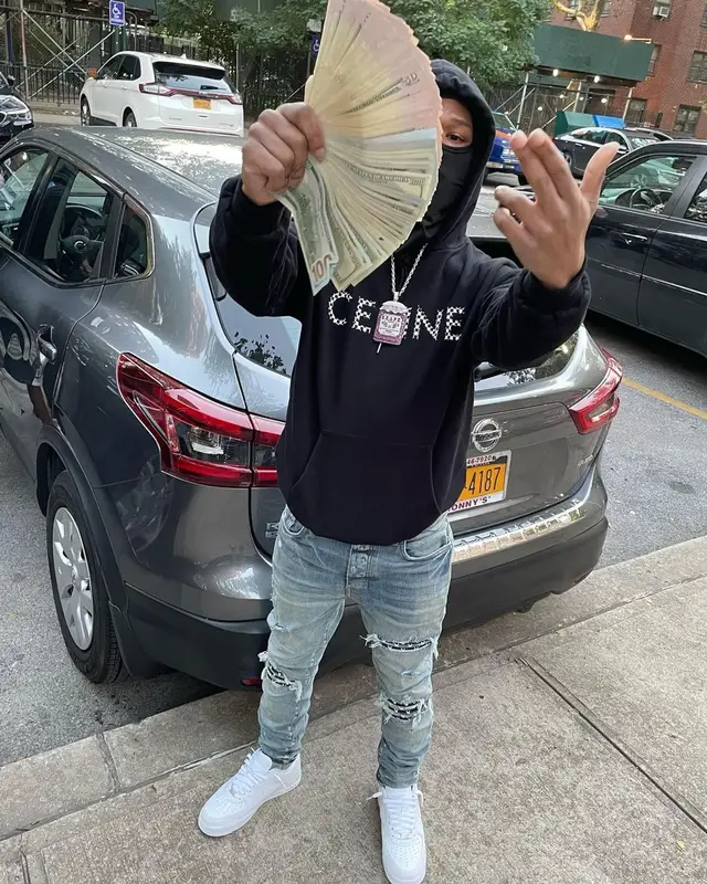 B Lovee outfit in Celine, Amiri, and Nike, 2021