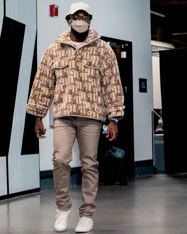 Donovan Mitchell outfit in Nanushka, John Elliott, and Louis Vuitton, 2021