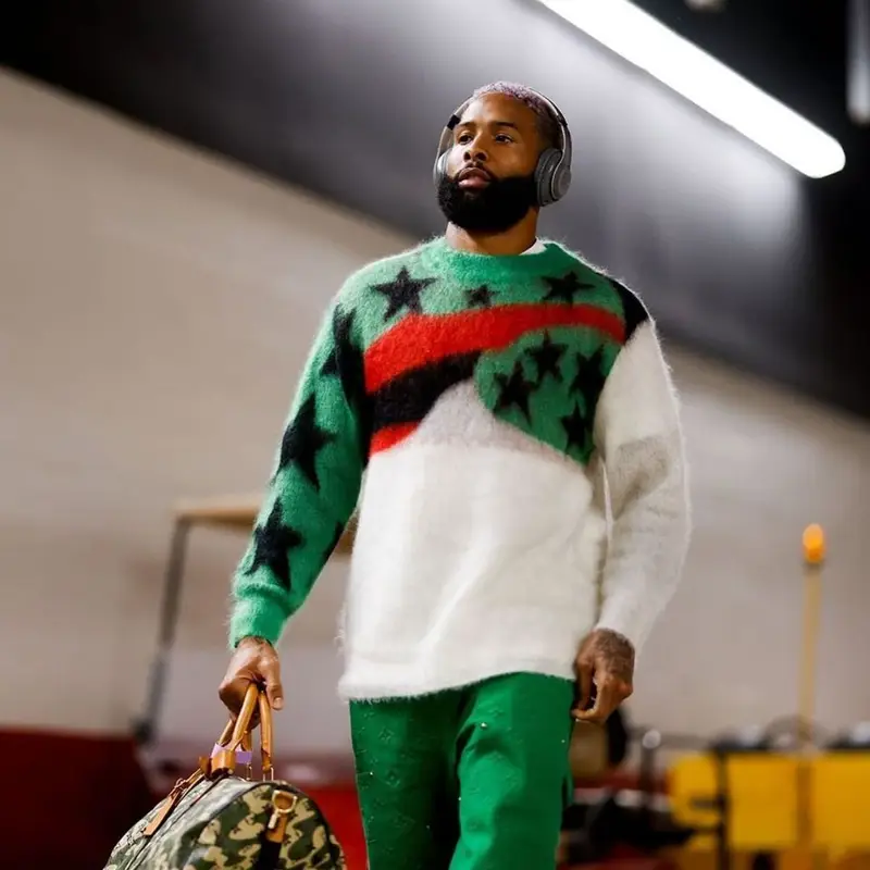 Odell Beckham Jr outfit in Denim Tears, Louis Vuitton, and Takashi Murakami, 2021