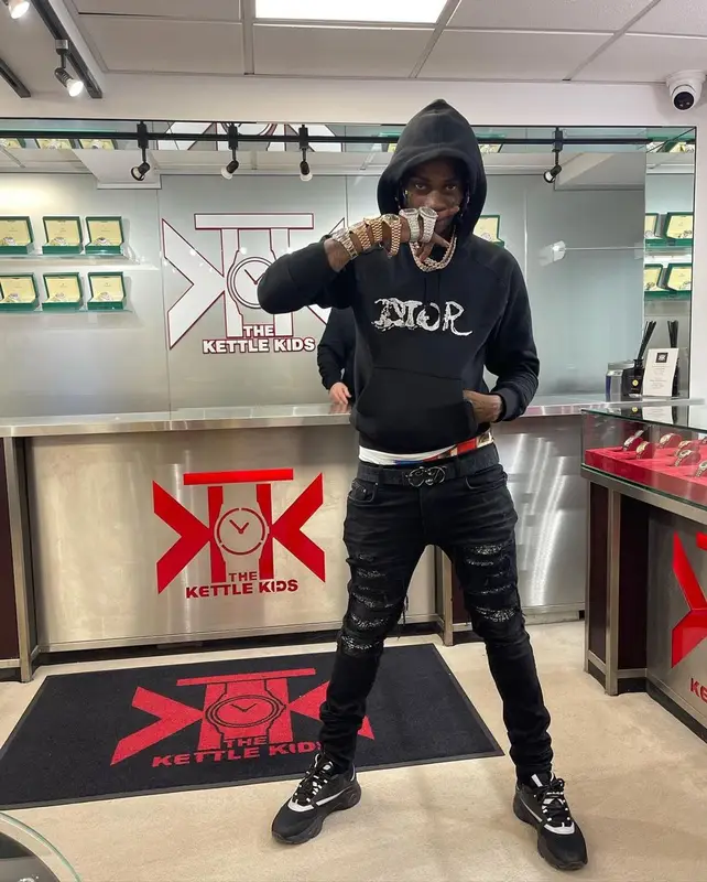 Russ Millions outfit in Dior, Amiri, and Peter Doig, 2021