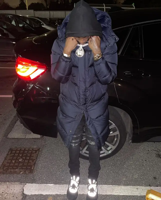 Russ Millions outfit in Dior, Amiri, and Peter Doig, 2021