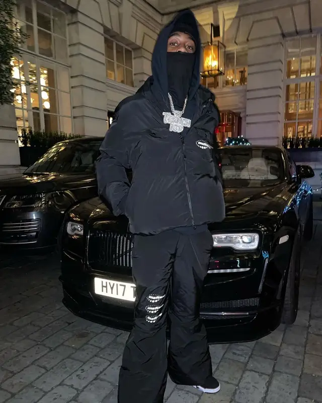 Lil Tjay outfit in MSFTSrep, Jordan, and No Name, 2021
