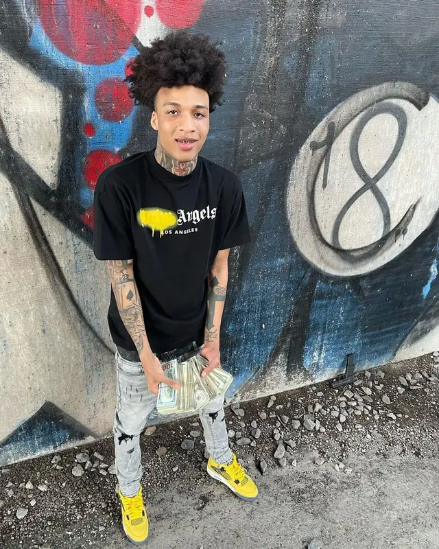 Backstreet TK outfit in Palm Angels, Jordan, and Louis Vuitton, 2021