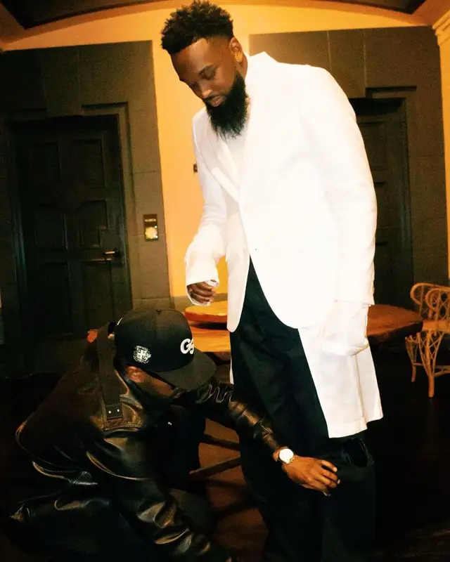 Dante Bowe outfit in Comme Des Garcons, Raf Simons, and Prada, 2021