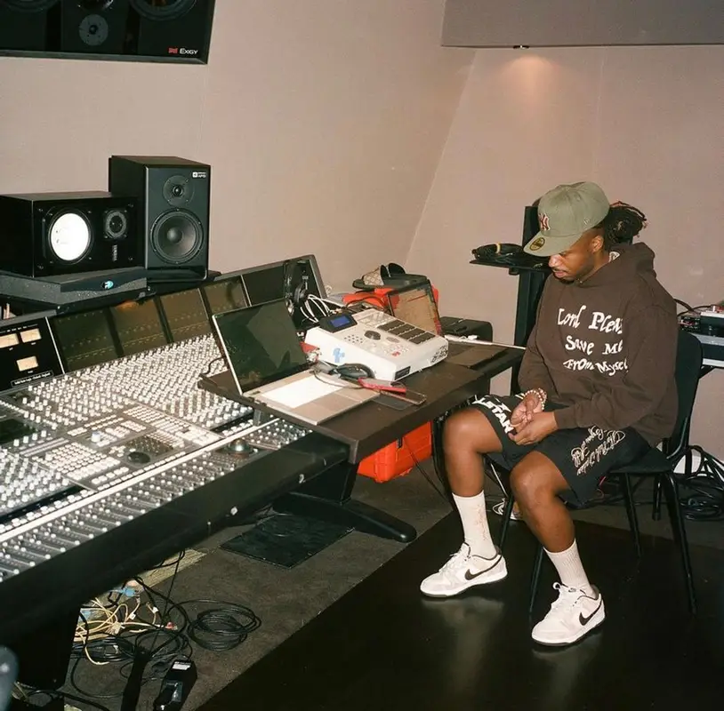 Metro Boomin outfit in Natural Division, New Era, and Cactus Jack, 2021