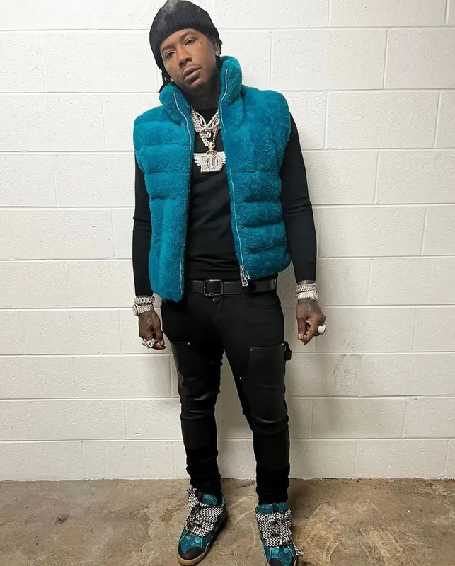 Moneybagg Yo outfit in Bottega Veneta, Louis Vuitton, and Moncler, 2021