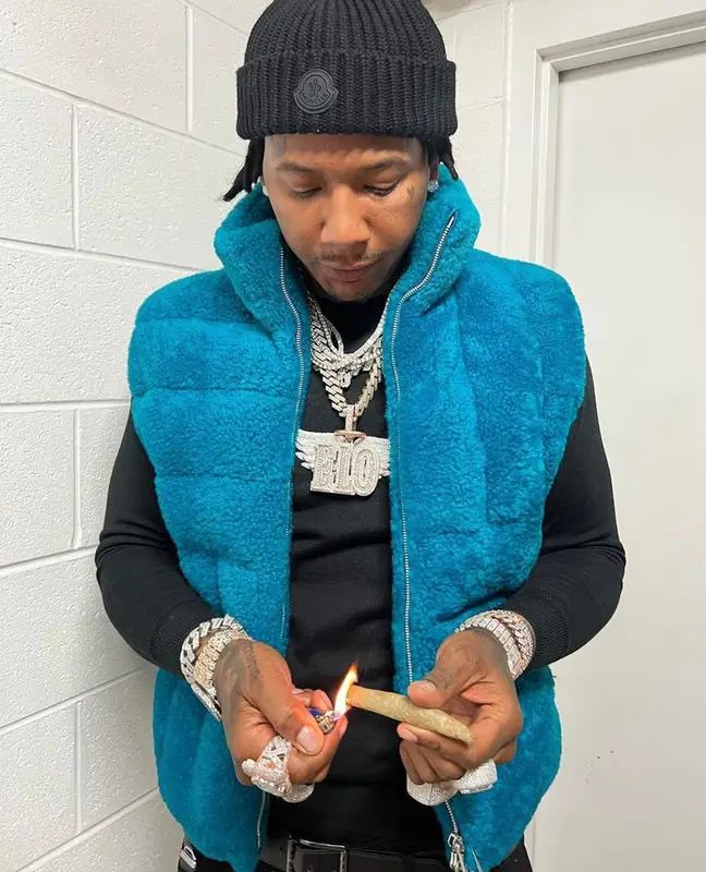 Moneybagg Yo outfit in Bottega Veneta, Louis Vuitton, and Moncler, 2021