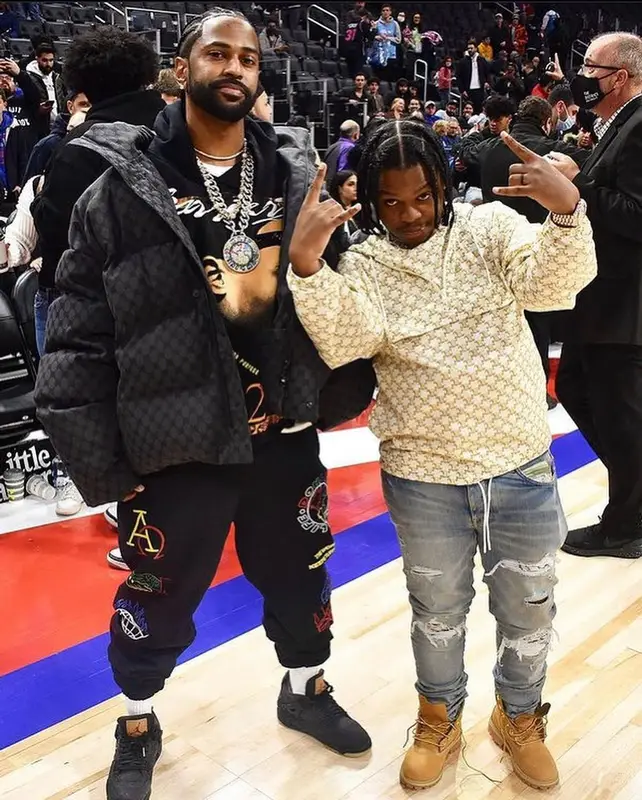42 Dugg outfit in Celine, Amiri, and Timberland, 2021