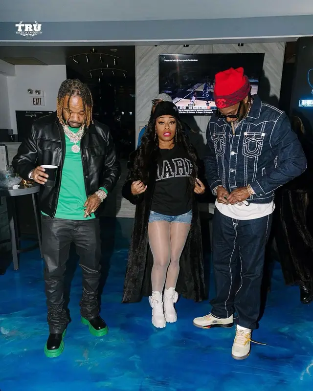 2 Chainz outfit in True Religion, Louis Vuitton, and 2 Chainz Merch, 2021