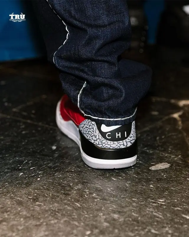 2 Chainz outfit in True Religion, Louis Vuitton, and 2 Chainz Merch, 2021