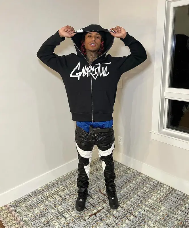 Lil Gnar outfit in Rhude, Nike, and Hats La, 2021