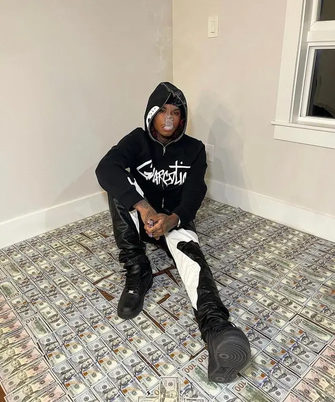 Lil Gnar outfit in Rhude, Nike, and Hats La, 2021
