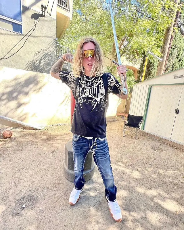 Jeris Johnson outfit in Converse, B.B. Simon, and Hood by Air, 2021