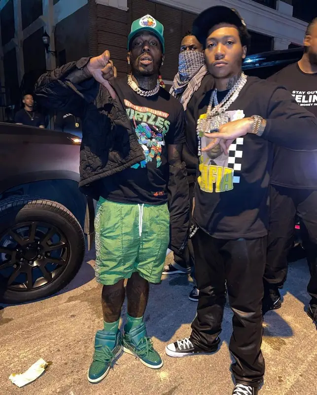 Sauce Walka outfit in Louis Vuitton, Clutch City Clothing, and Global Currency, 2021