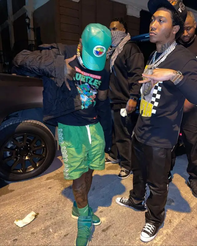 Sauce Walka outfit in Louis Vuitton, Clutch City Clothing, and Global Currency, 2021