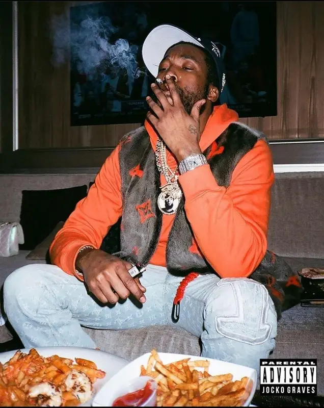 Meek Mill outfit in Louis Vuitton, NBA, and Nike, 2021
