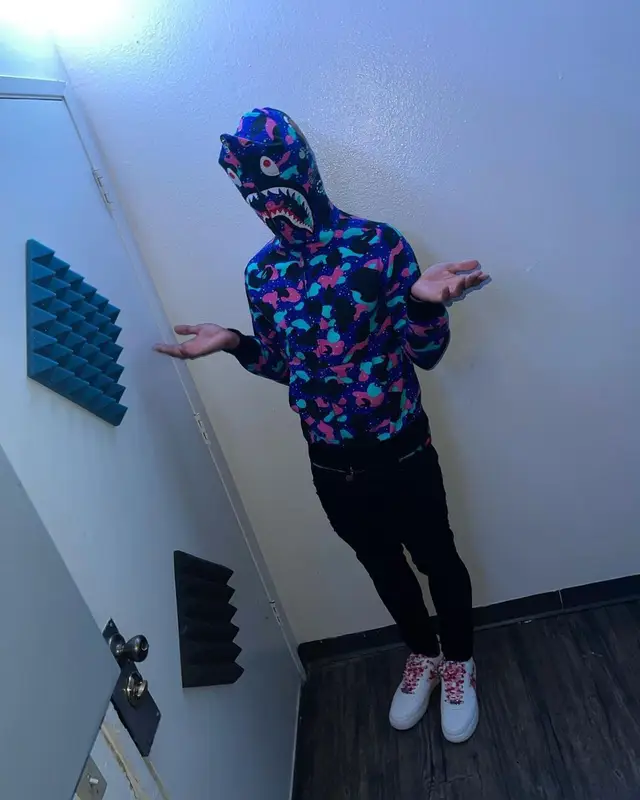 Mikey outfit in Bape, Valabasas, and Kid Cudi Merch, 2021