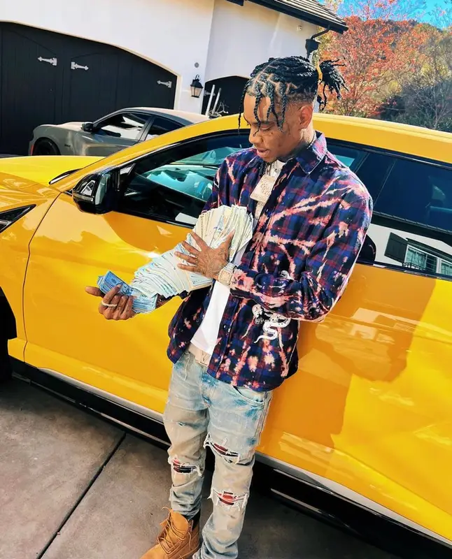 Soulja Boy outfit in FashionNova, Amiri, and Louis Vuitton, 2021