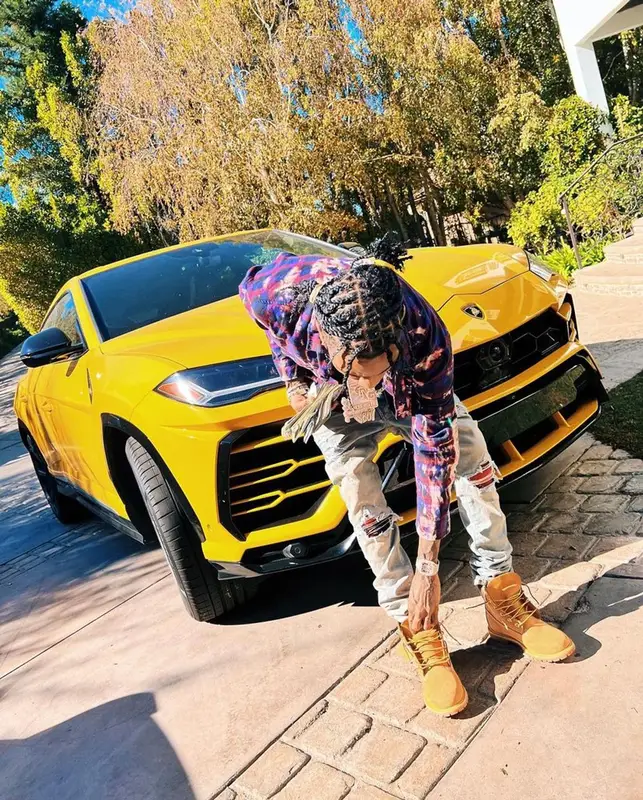 Soulja Boy outfit in FashionNova, Amiri, and Louis Vuitton, 2021