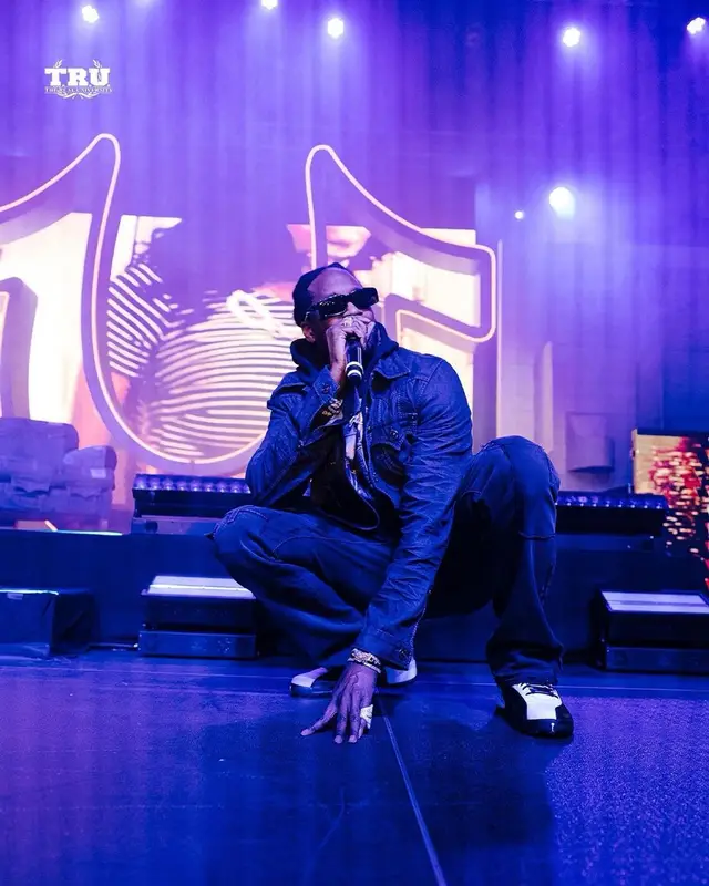 2 Chainz outfit in True Religion, Balenciaga, and 2 Chainz Merch, 2021