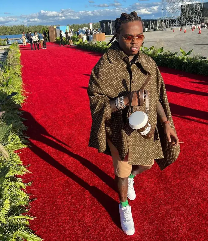 Gunna outfit in Louis Vuitton, Nike, and Cartier, 2021