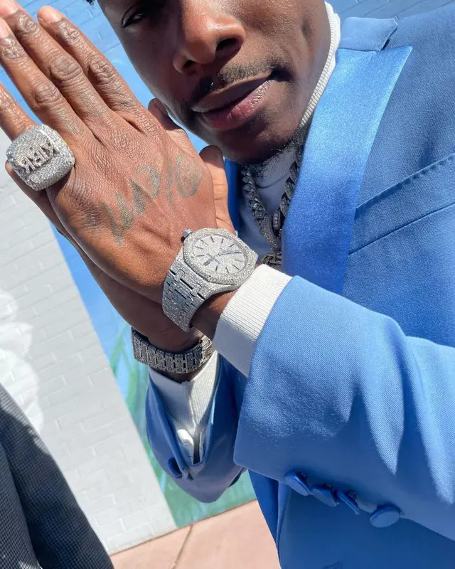 DaBaby outfit in Burberry and Louis Vuitton, 2021