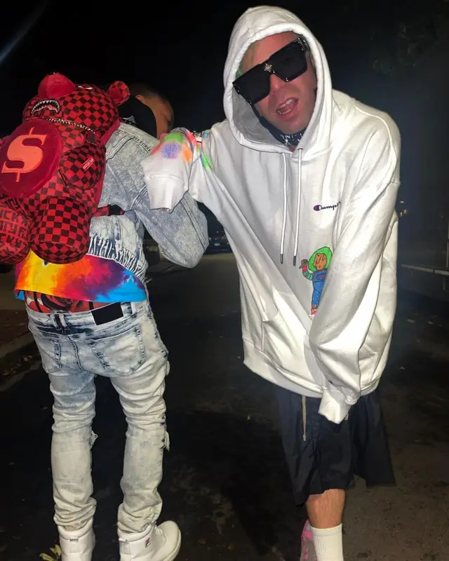 RealYungG outfit in Fila and Sprayground, 2021