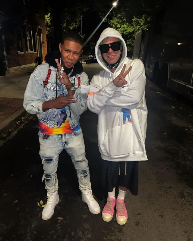 RealYungG outfit in Fila and Sprayground, 2021