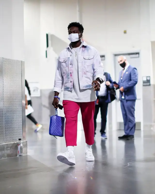 Marquise Goodwin outfit in Isabel Marant, Homme, and Issey Miyake, 2021