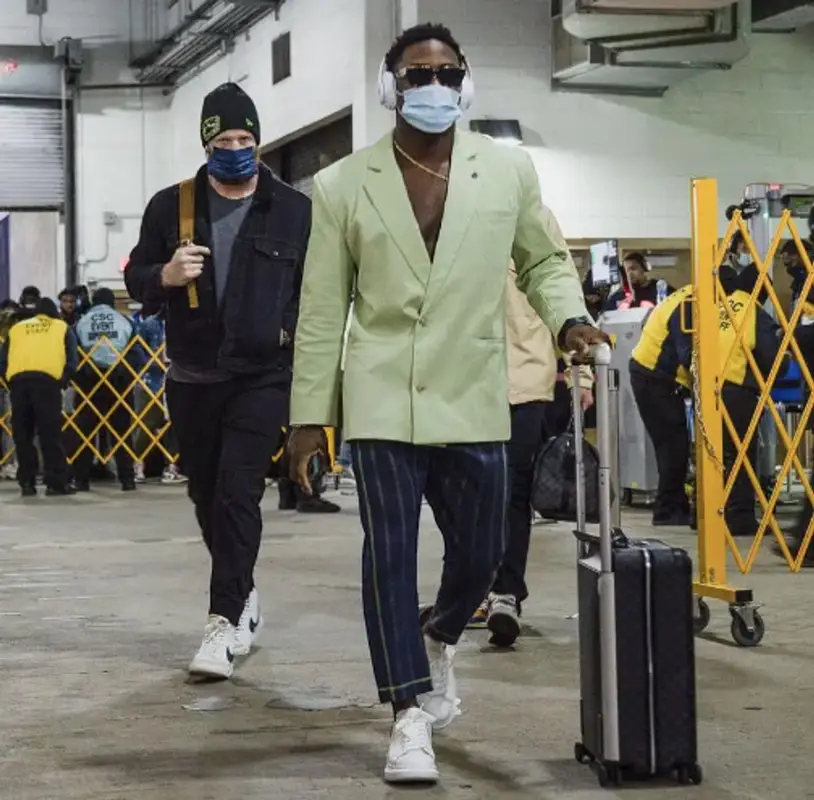 Ugo Amadi outfit in Daily Paper, Vivienne Westwood, and Alexander McQueen, 2021