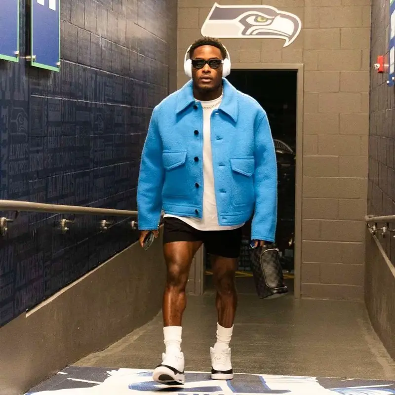 Ugo Amadi outfit in Ami, Dries Van Noten, and Retrosuperfuture, 2021