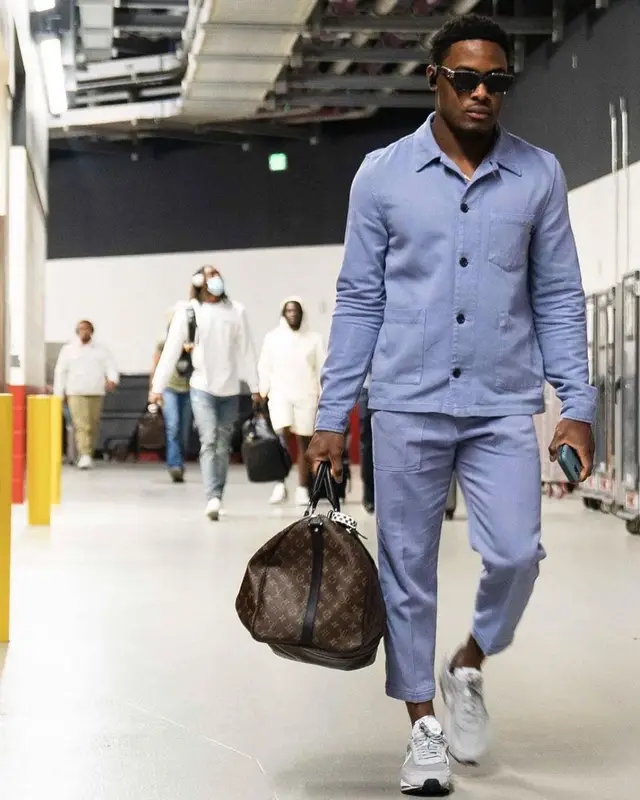 Ugo Amadi outfit in Paul Smith, Nike, and Sacai, 2021
